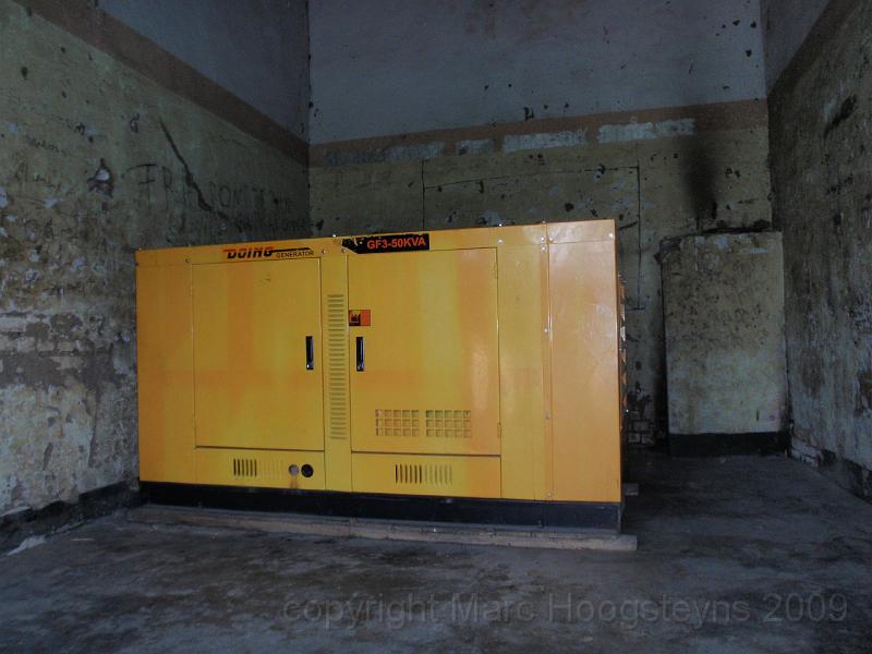 12 This generator was a present from Kabila but officials have no money for fuel or electric cable to meka this thing work.jpg